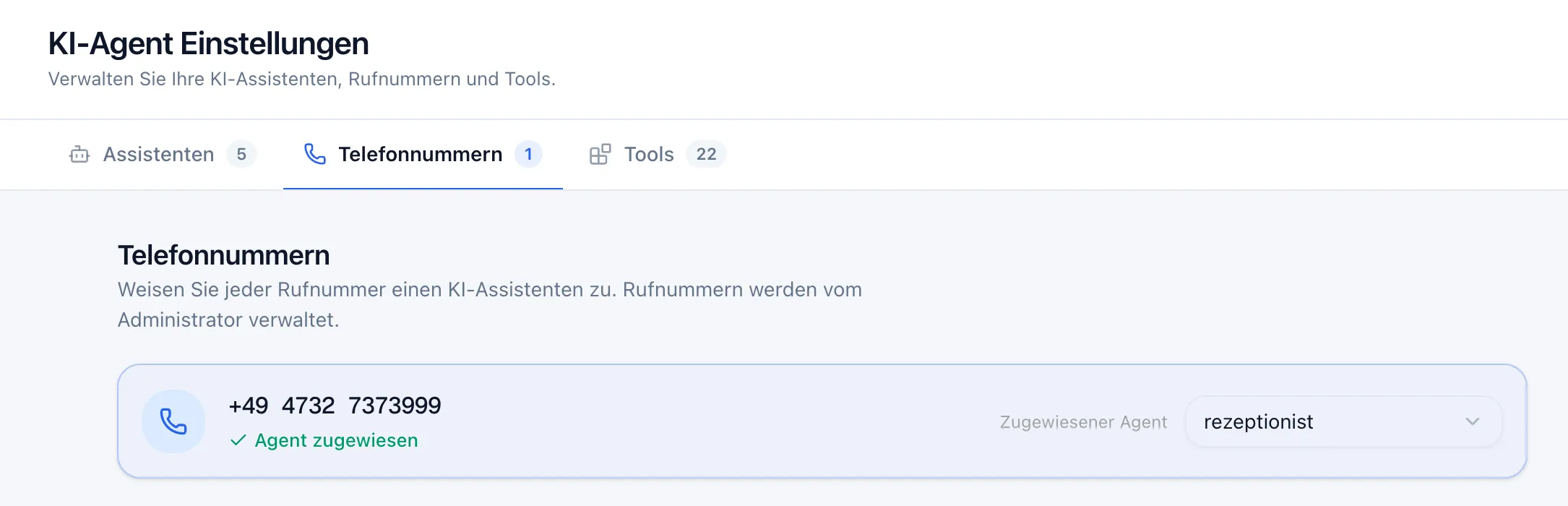 Tab „Telefonnummern“ mit einer Rufnummer, grünem Status „Agent zugewiesen“ und dem Dropdown „Zugewiesener Agent“